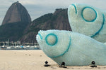 Giant fish statues made with plastic bottles on beach in Rio de Janeiro