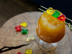 Cocktail glass with gummy bear garnishes