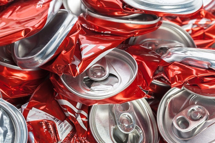 Crushed red aluminum soda cans